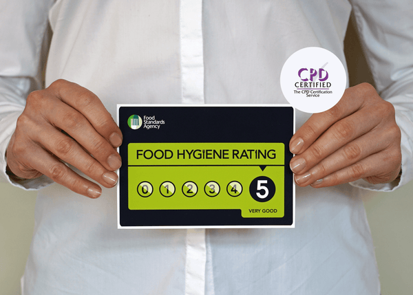 Person holding a food hygiene rating card with a 5-star rating, featuring the Food Standards Agency logo.