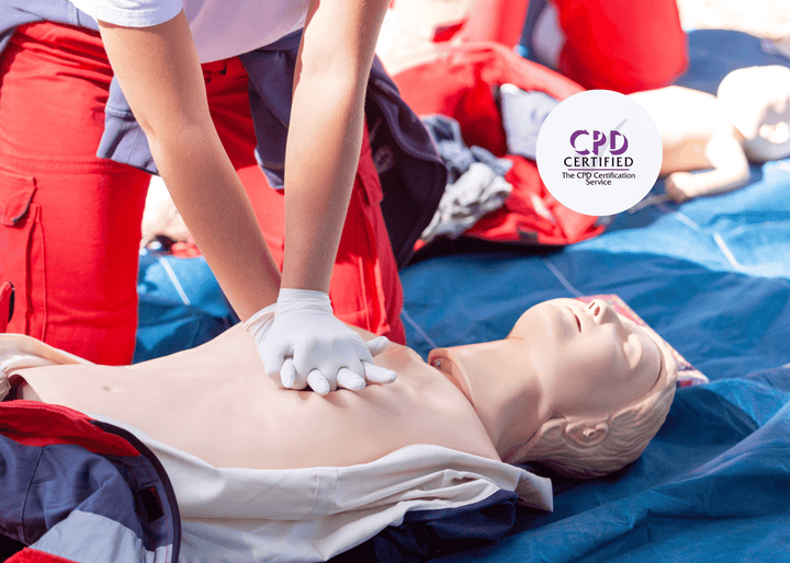 A close-up shows hands performing chest compressions on a CPR manikin, demonstrating essential emergency first aid training techniques for saving lives.