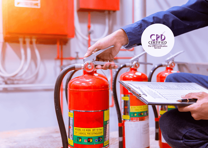 A fire safety inspector, clipboard in hand, carefully checks the pressure gauge on a red fire extinguisher.
