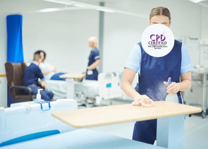 Healthcare worker cleaning and disinfecting an overbed hospital table with spray and cloth to maintain infection control standards.