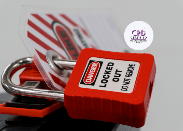 Close-up of a red lockout padlock and tag, demonstrating safe isolation procedures in CPD Lockout/Tagout training.
