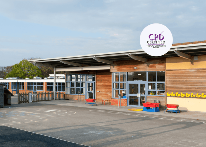 Primary school exterior with shut doors and an empty playground, symbolising preparedness and safety measures for lockdown procedures in schools.