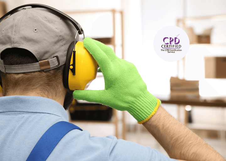 Worker wearing bright yellow noise-reduction headphones and bright green safety gloves, highlighting the importance of protective equipment in noisy environments.