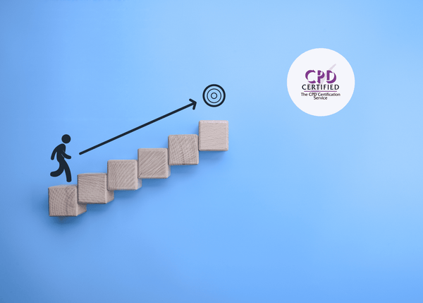 Wooden blocks stacked as steps with a stick figure ascending toward a target symbol, set against a blue background.