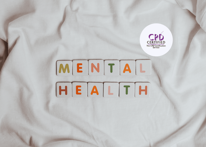 Letter tiles forming the words “Mental Health,” neatly arranged in two rows on a white fabric background.