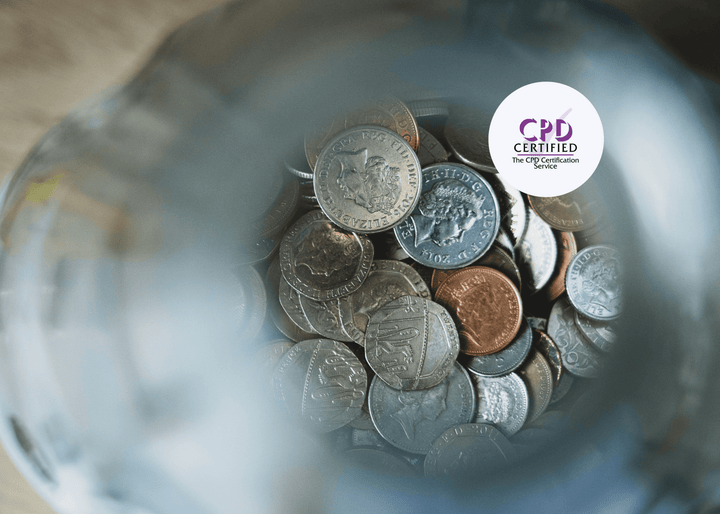 Close-up of a money management jar filled with mixed British coins, including pennies, 5p, 10p, and 50p pieces, symbolising savings and budgeting.
