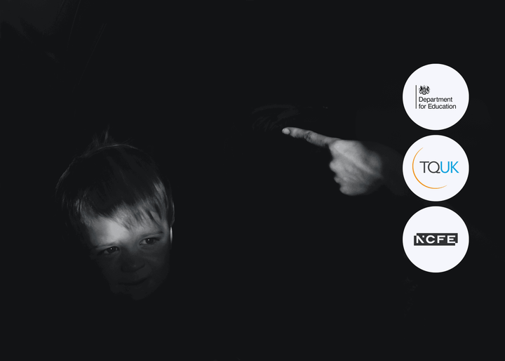 A young boy stands in shadow with only part of his face illuminated, while an adult’s pointing hand is visible in the darkness, suggesting conflict or blame.