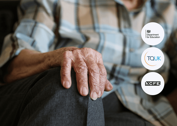 ChatGPT said:

A detailed close-up shows an elderly person’s hand resting on their knee, dressed in a plaid shirt and dark trousers, reflecting themes of ageing and care.