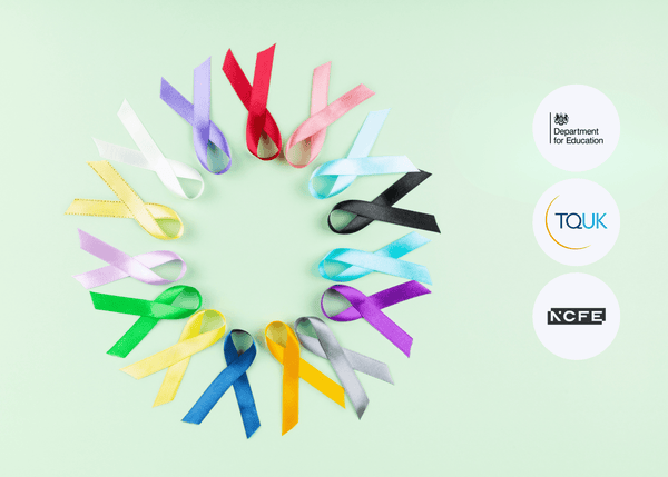 A circle of awareness ribbons in different colours displayed on a pale green background, each ribbon neatly looped and laid flat to symbolise support.