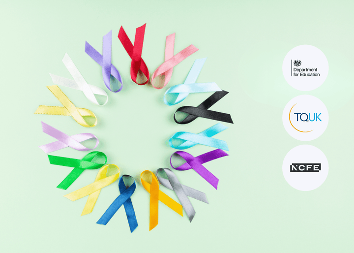 A circle of awareness ribbons in different colours displayed on a pale green background, each ribbon neatly looped and laid flat to symbolise support.